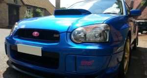 Why Do Some Subaru Cars Have Pink Badges?